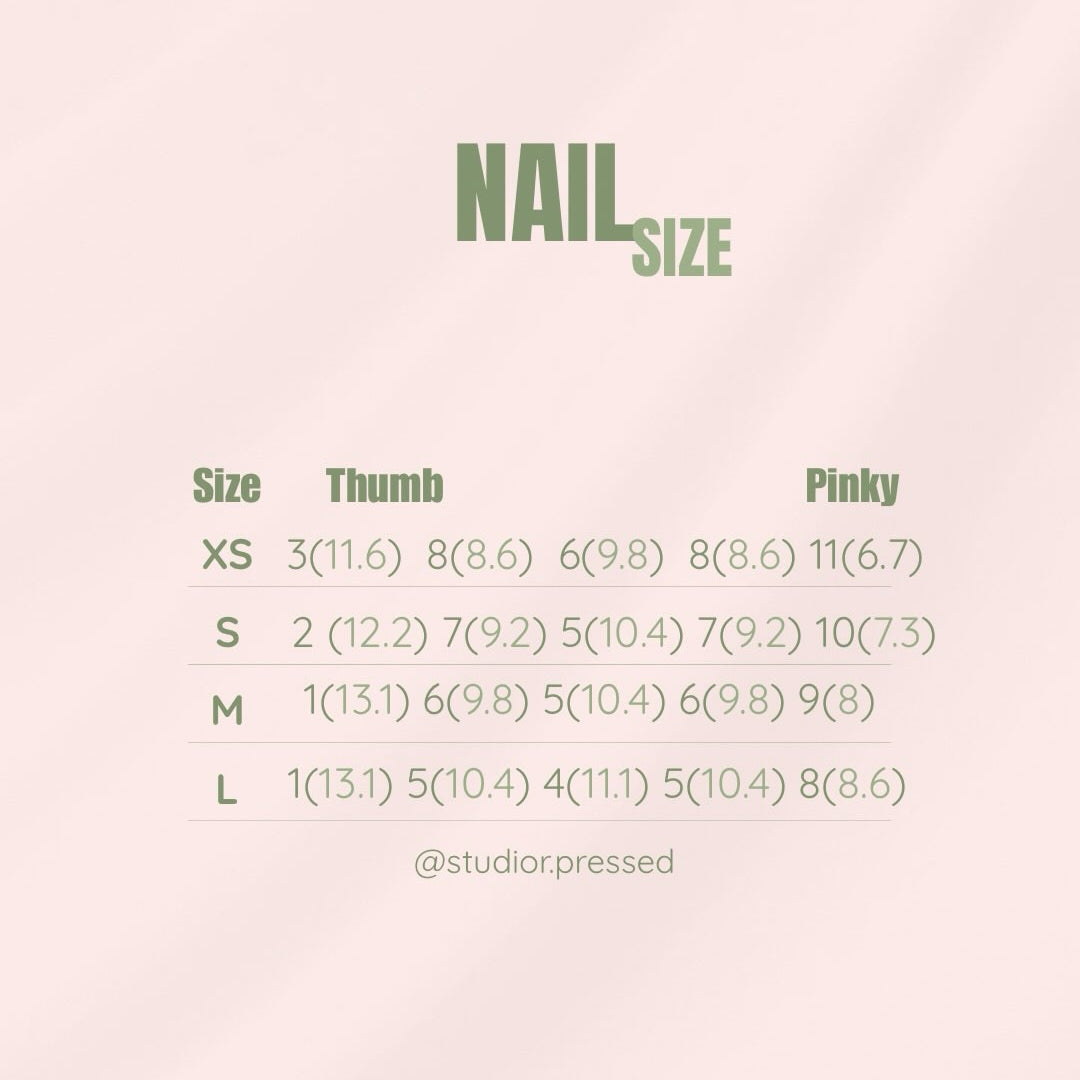 Nail size chart graphic on a pale blush background, showing size guides for thumb and pinky fingers from XS to L with measurements, plus the text @studiorpressed.